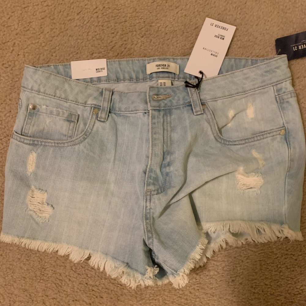 Mid rise light denim shorts